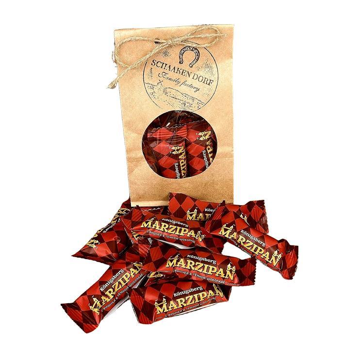 Конфеты ШААКЕН ДОРФ Марципан в темном шоколаде с вишней 300 гр., крафт