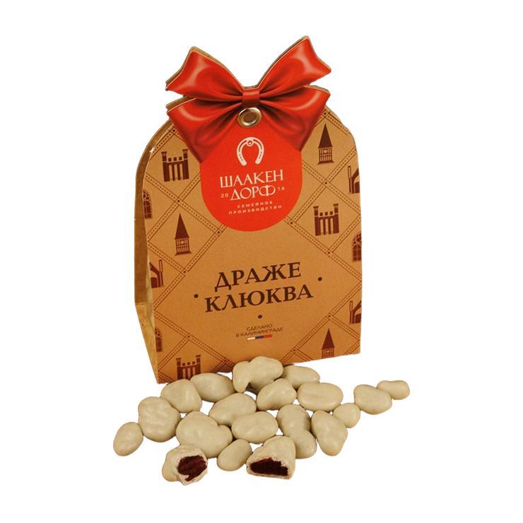 Драже ШААКЕН ДОРФ Клюква в белом шоколаде 150 гр., картон