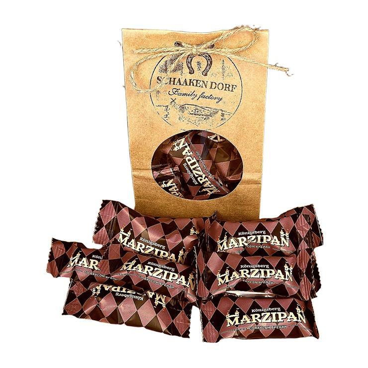 Конфеты ШААКЕН ДОРФ Марципан в темном шоколаде со вкусом бренди 300 гр., крафт