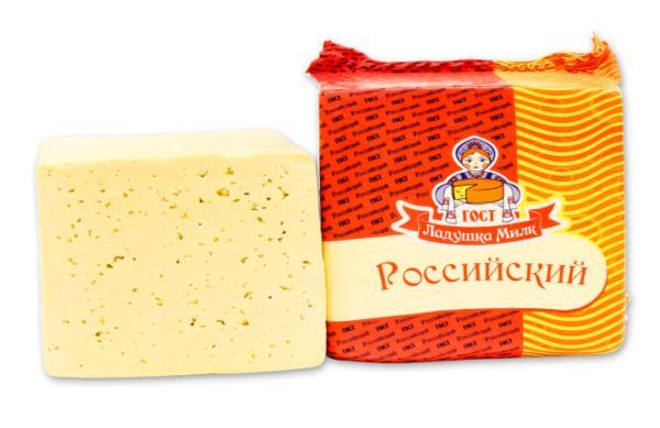 Продукт сырный полутвердый Ладушка Милк Российский 50% квадрат 1 кг., пленка