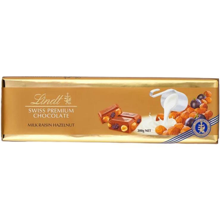 Шоколад Lindt Swiss premium молочный с изюмом и цельным фундуком 300 гр., обертка
