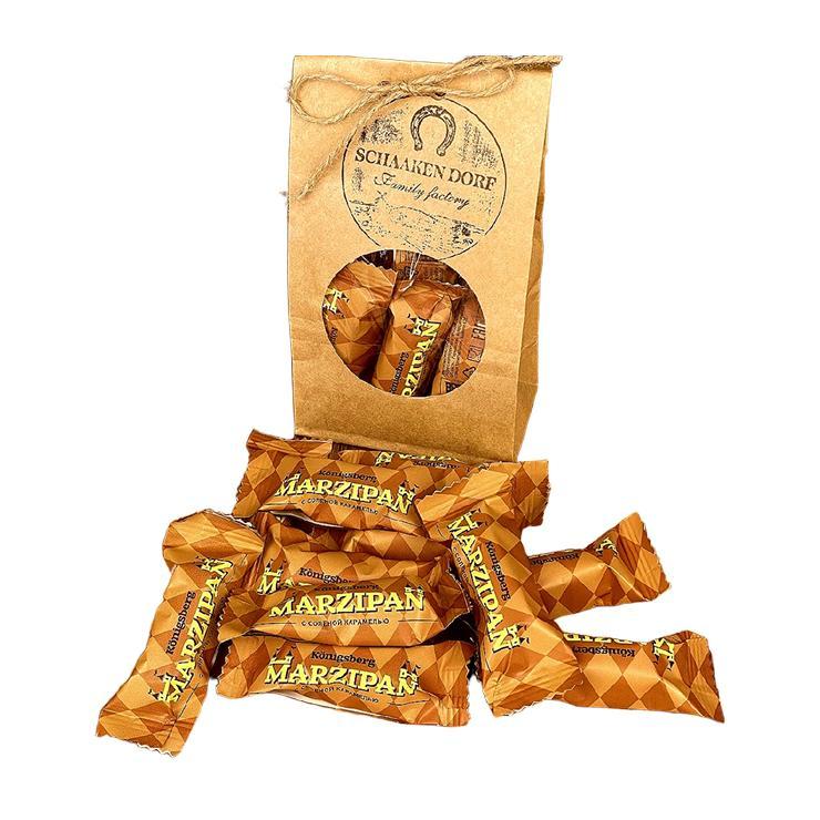 Конфеты ШААКЕН ДОРФ Марципан в молочном шоколаде с соленой карамелью 300 гр., крафт