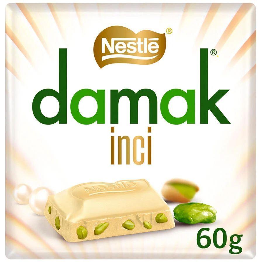 Шоколад Nestle Damak белый с фисташкой 60 гр., обертка
